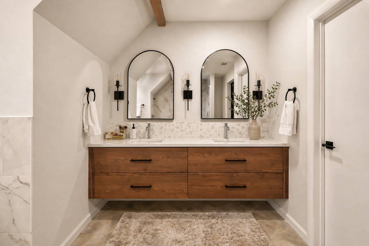 Rolling_Hills_Master_Bath_Floating_Vanity_Warm Floating walnut wood vanity with semi arch mirrors